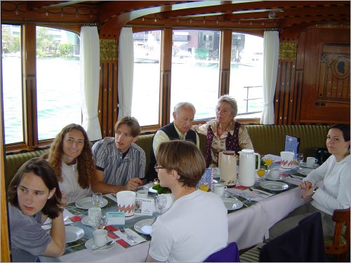 in the boat having breakfast